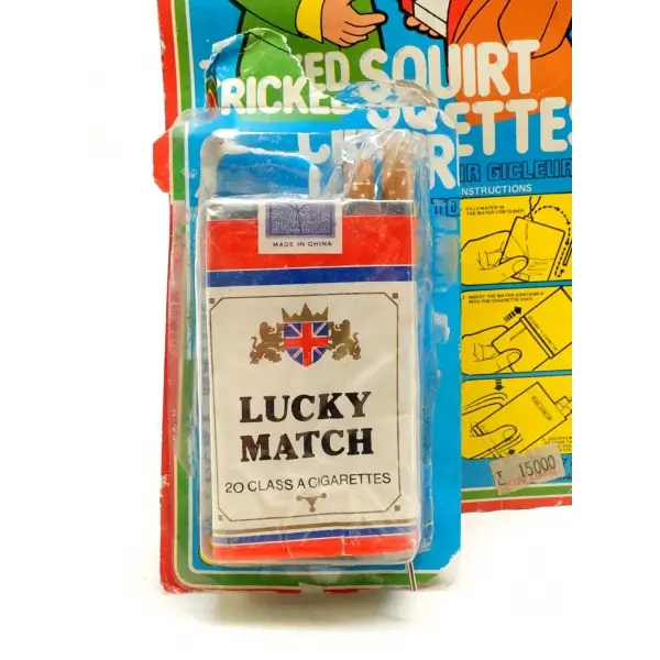 Orijinal kutusunda Çin malı ´´Trick Squirt Cigarettes´´, su fışkırtan sigara oyuncağı, paketi haliyle, 22x13 cm