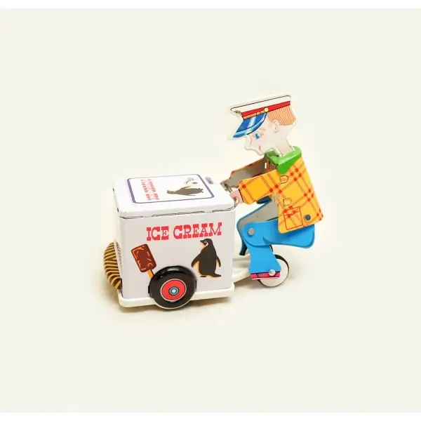 Orijinal kutusunda Japon malı Masudaya Corp marka teneke dondurmacı, çek bırak mekanizmalı, kutusu haliyle, 12x10x5 cm