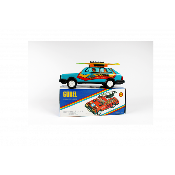 Gürel orta boy teneke araba, Sürtmeli Golf model, Anadolu Tur Acentası yazılı, kendi kutusunda, çil durumda, 21x9 cm